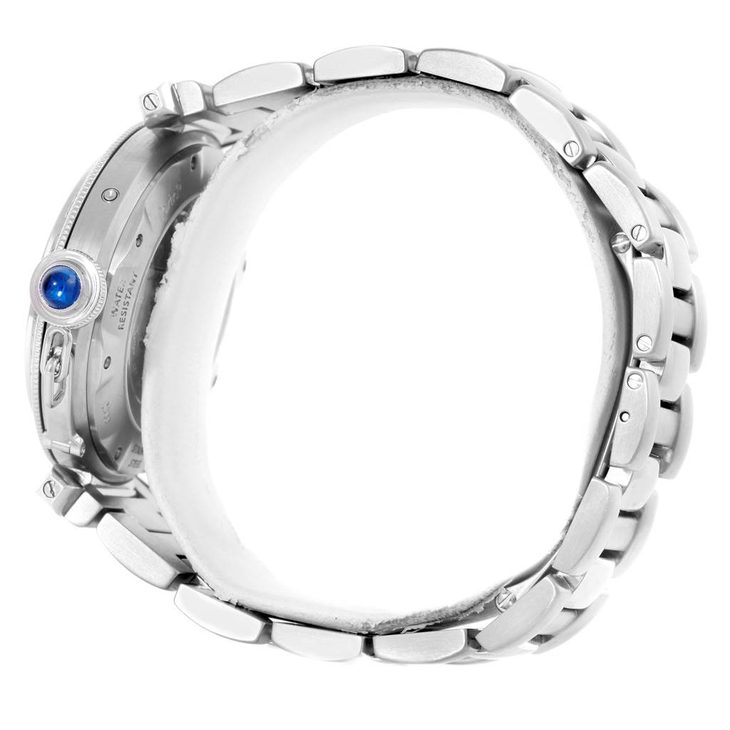 The image shows a side view of a Cartier Pasha W31037H3 Men's Stainless Steel Silver Dial W31037H3 Men's Stainless Steel Silver Dial watch, highlighting its metallic band and distinctive crown with a blue cabochon.