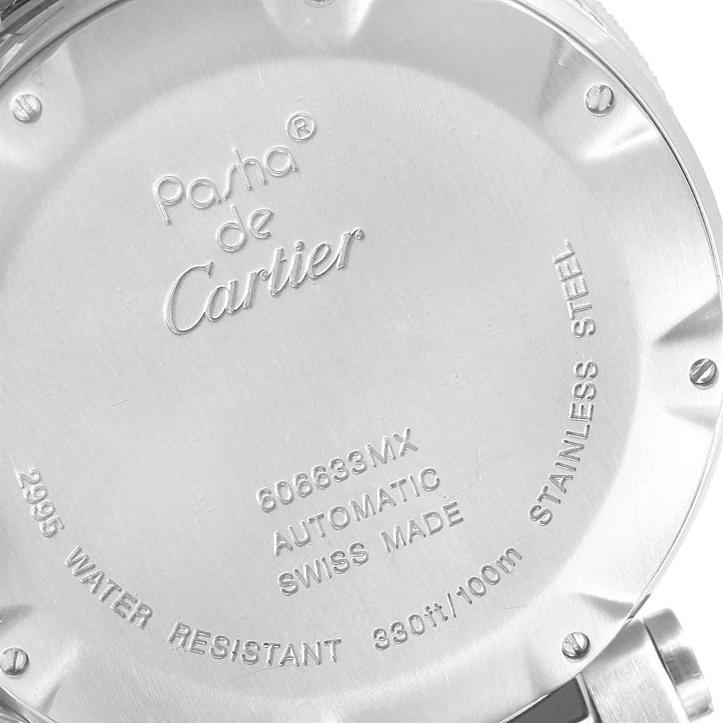 The image shows the backside of a Pasha de Cartier watch, detailing its model number and specifications.