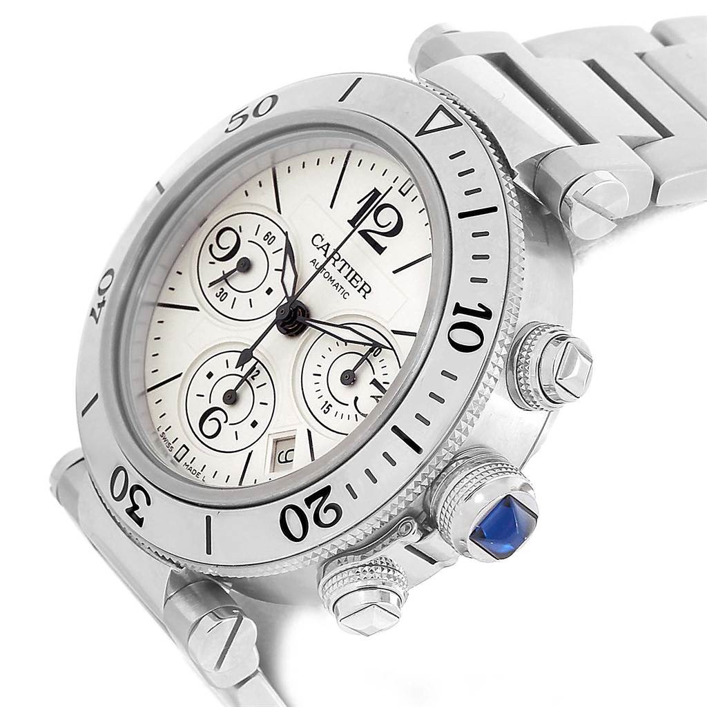 The image shows the face and right side of the Cartier Pasha W31089M7 Men's Stainless Steel Silver Dial W31089M7 Men's Stainless Steel Silver Dial watch, highlighting its dial, chronograph subdials, and crown.