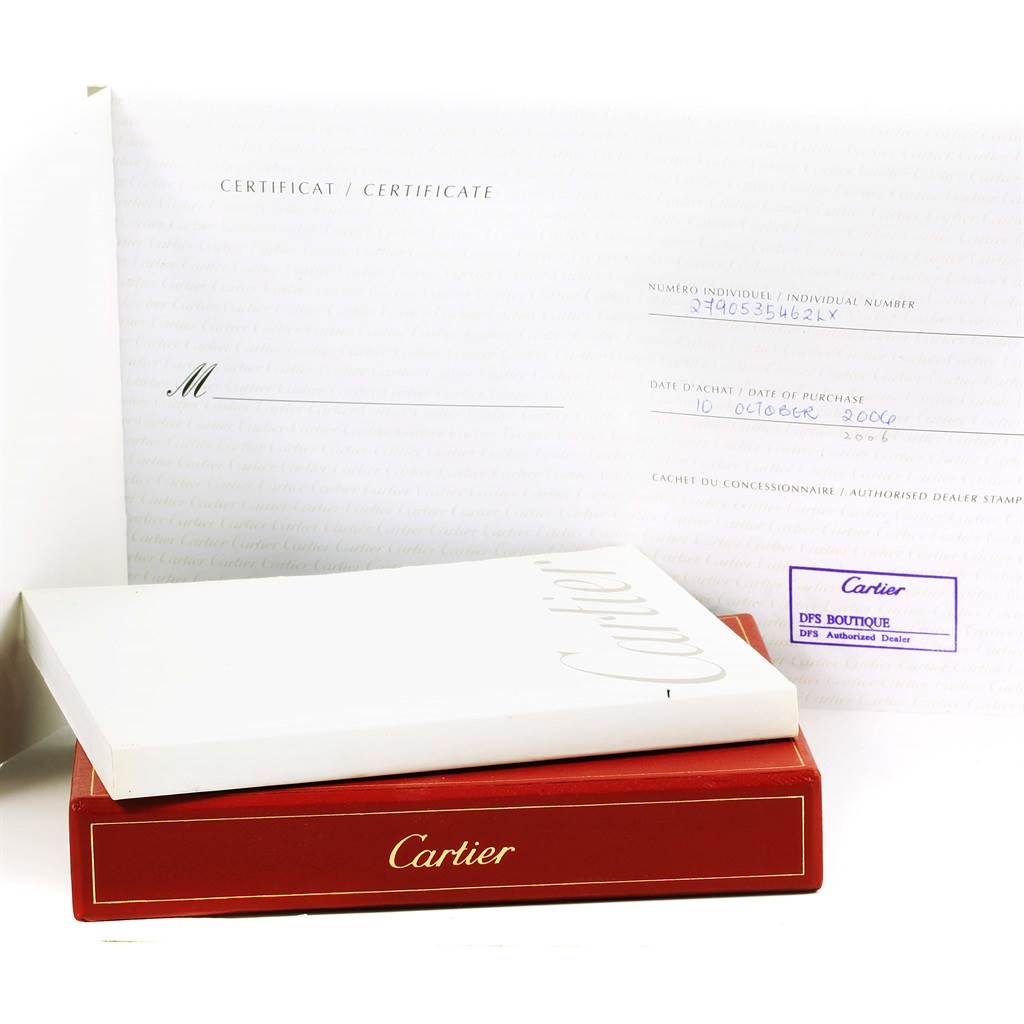 The image shows the certificate and packaging for a Cartier Pasha W31077U2 Men's Stainless Steel Black Dial W31077U2 Men's Stainless Steel Black Dial model watch, including a white booklet and red box.
