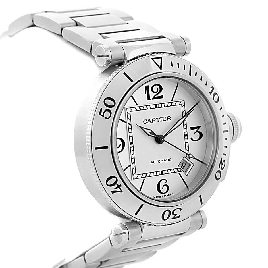This image shows a Cartier Pasha W31080M7 Men's Stainless Steel Silver Dial W31080M7 Men's Stainless Steel Silver Dial model watch at an angle highlighting the face, bezel, and part of the metal bracelet.