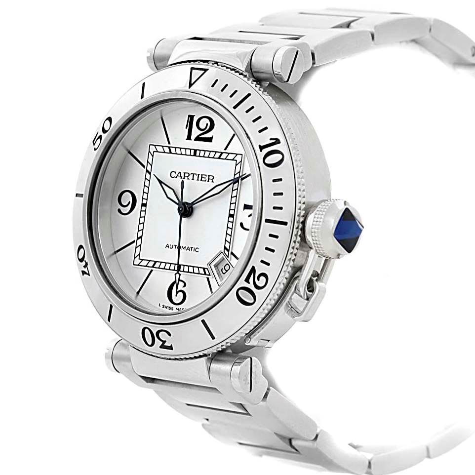 This image shows a Cartier Pasha W31080M7 Men's Stainless Steel Silver Dial W31080M7 Men's Stainless Steel Silver Dial watch at an angled side view, highlighting the dial, bezel, crown, and part of the bracelet.