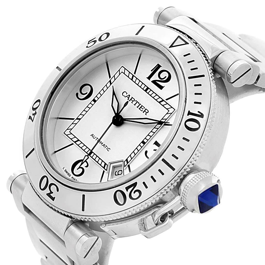 The image shows a close-up, angled view of the Cartier Pasha W31080M7 Men's Stainless Steel Silver Dial W31080M7 Men's Stainless Steel Silver Dial watch, highlighting its dial, bezel, and crown.