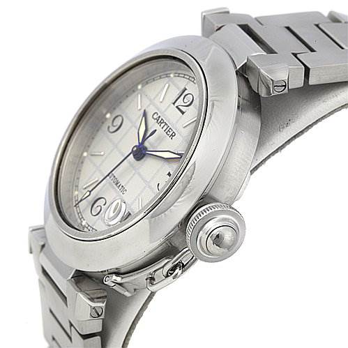 The image shows a side angle of the Cartier Pasha W31023M7 Women
s Stainless Steel Silver Dial W31023M7 Women
s Stainless Steel Silver Dial watch, highlighting the bezel, dial, crown, and portion of the bracelet.