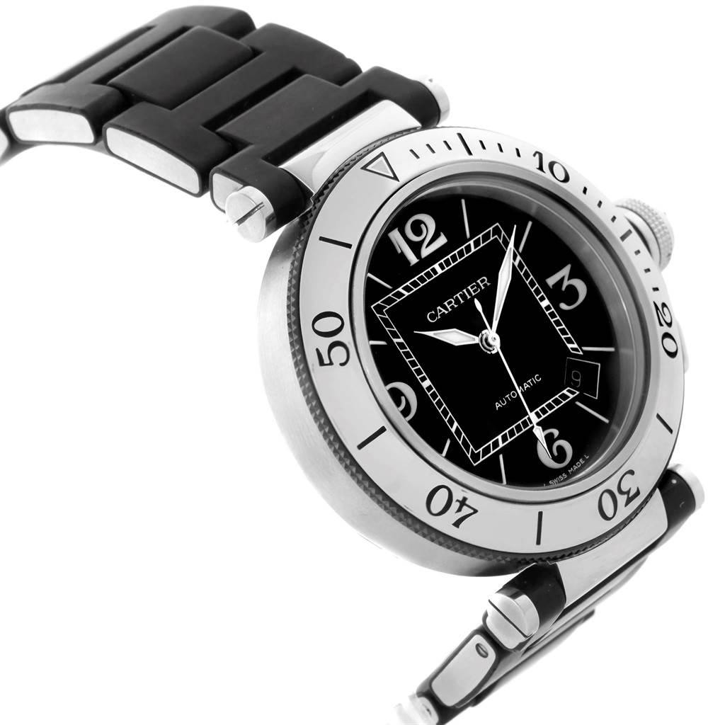 The image shows a close-up side angle of a Cartier Pasha W31077U2 Men's Stainless Steel Black Dial W31077U2 Men's Stainless Steel Black Dial model watch, highlighting its bezel, dial, and part of the strap.