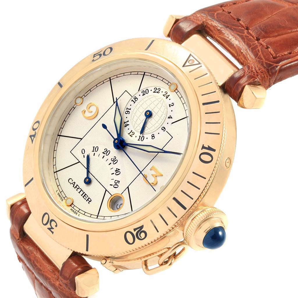 The image shows a close-up of a Cartier Pasha W30144D1 Men's Yellow Gold Silver Dial W30144D1 Men's Yellow Gold Silver Dial watch, highlighting the watch face, bezel, and brown leather strap, at a slight angle.