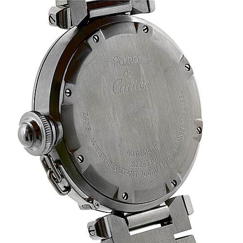 The image shows the back case and part of the metal bracelet of a Cartier Pasha W31055M7 Stainless Steel Black Dial W31055M7 Stainless Steel Black Dial watch, focusing on its engravings and the crown guard.