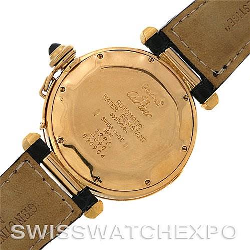 The image shows the back case of a Cartier Pasha Women's Yellow Gold Silver Dial Women's Yellow Gold Silver Dial watch, highlighting the engraved text and strap attachments.