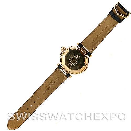 The image shows the back view of a Cartier Pasha Women's Yellow Gold Silver Dial Women's Yellow Gold Silver Dial watch, including the leather straps and the case back.