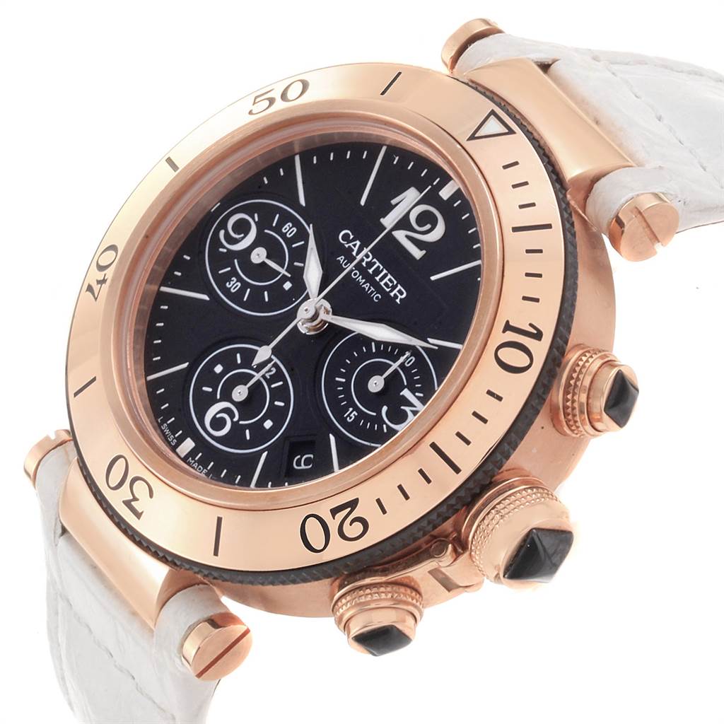This image shows a close-up angle of a Cartier Pasha W3030018 Men's Rose Gold Black Dial W3030018 Men's Rose Gold Black Dial watch, highlighting its bezel, dial, crown, and pushers.