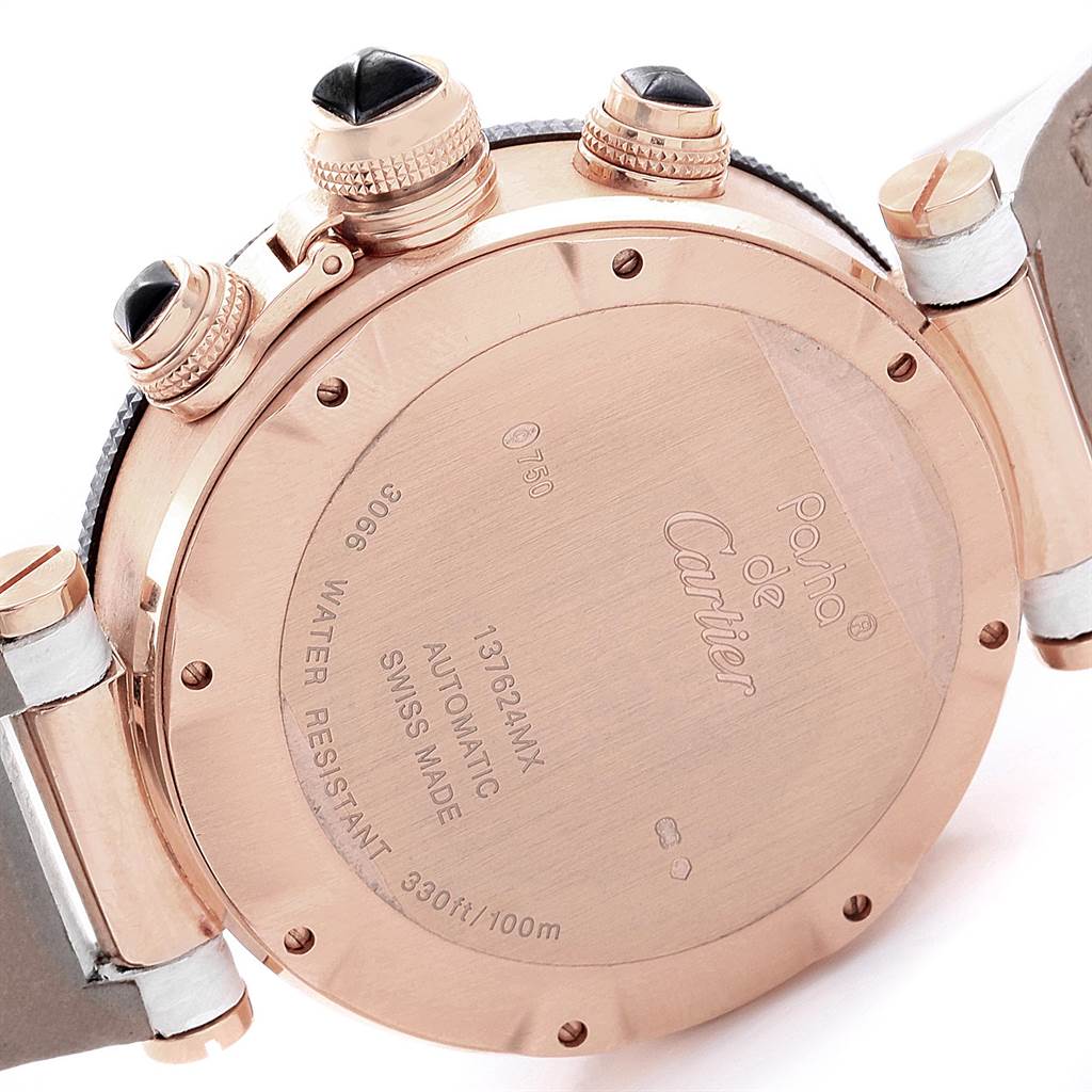 The image shows the back case and crown of the Cartier Pasha W3030018 Men's Rose Gold Black Dial W3030018 Men's Rose Gold Black Dial watch in a close-up angle.