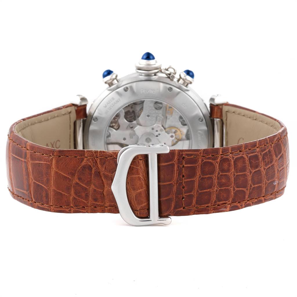 The Cartier Pasha W3103055 Men
s Stainless Steel Silver Dial W3103055 Men
s Stainless Steel Silver Dial watch is shown from the back, highlighting its leather strap and transparent case back.