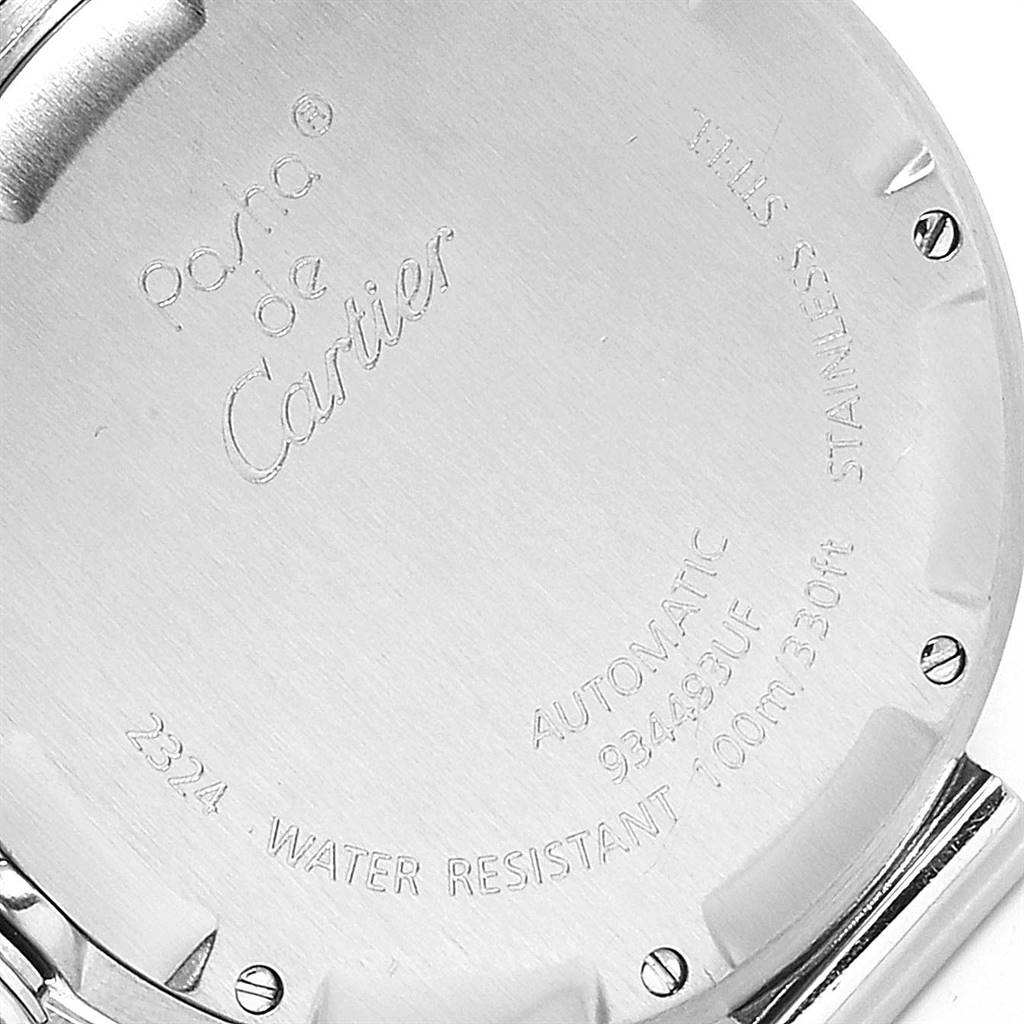 The image shows the back of a Cartier Pasha W31074M7 Stainless Steel White Dial W31074M7 Stainless Steel White Dial watch, displaying engravings like the brand name, model, serial number, and water resistance.