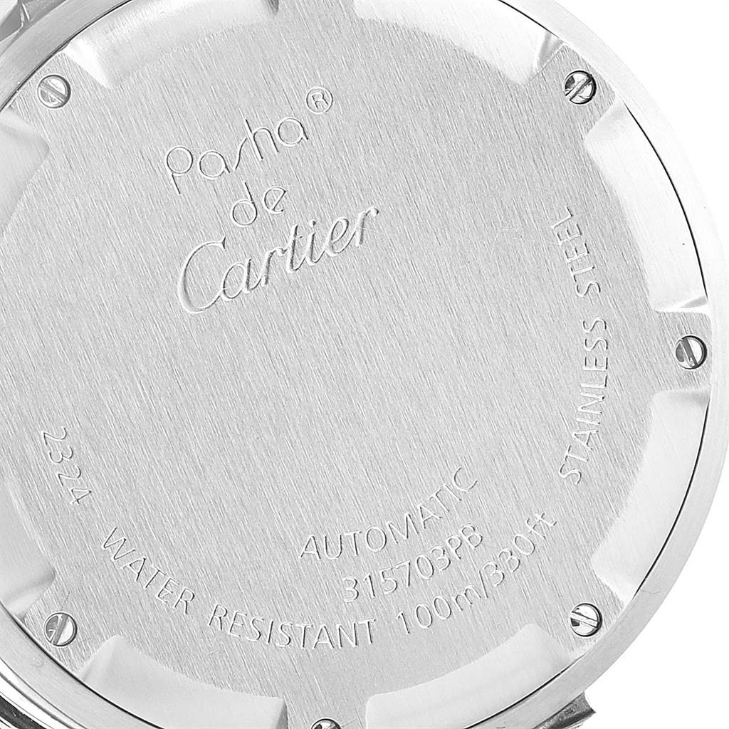 The image shows the back case of a Cartier Pasha W31074M7 Stainless Steel White Dial W31074M7 Stainless Steel White Dial watch, highlighting its inscriptions and screws.