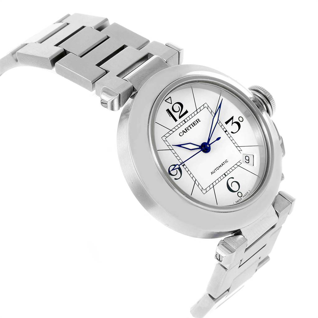 The image shows a side angle of a Cartier Pasha W31074M7 Stainless Steel White Dial W31074M7 Stainless Steel White Dial watch, highlighting its dial, case, and part of the metal bracelet.
