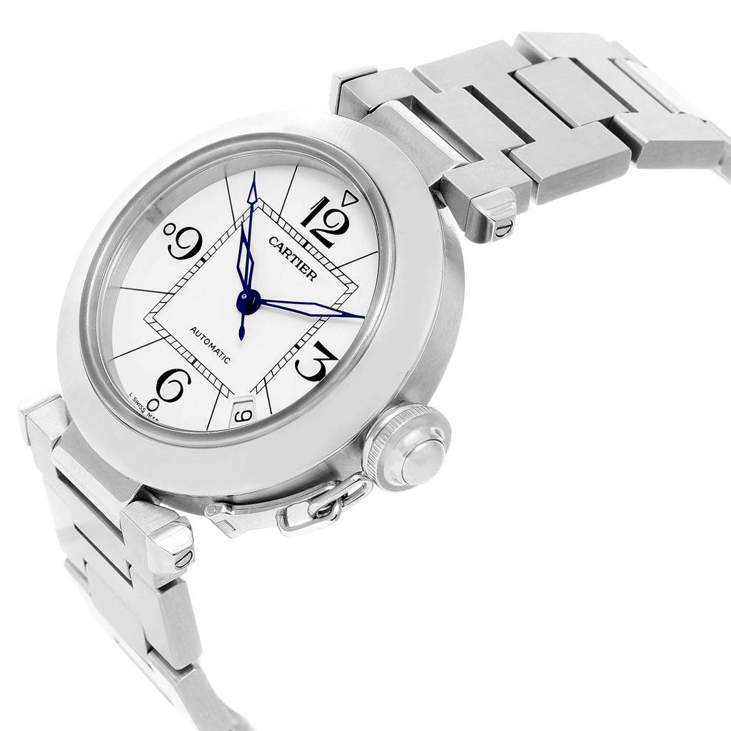 The image shows a Cartier Pasha W31074M7 Stainless Steel White Dial W31074M7 Stainless Steel White Dial model watch at a tilted angle, highlighting the face, bezel, crown, and part of the bracelet.