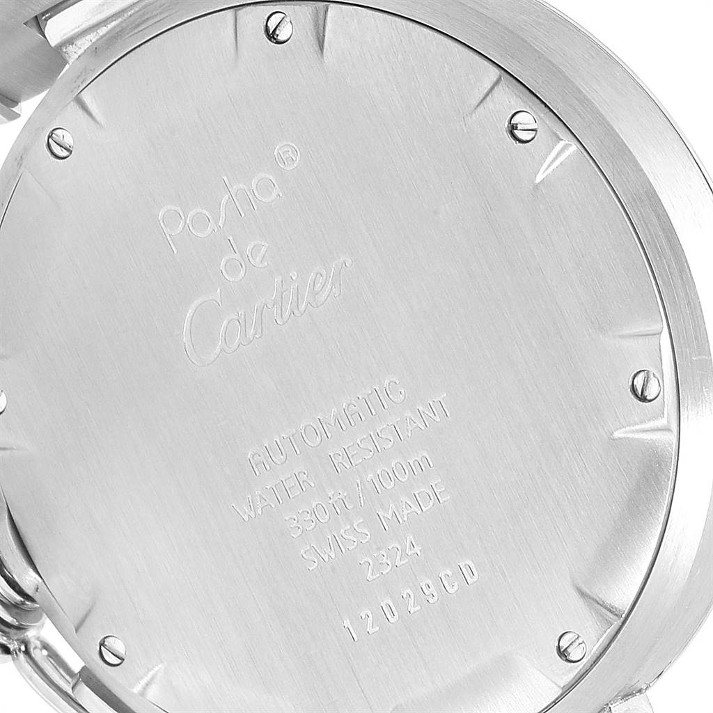 The image depicts the back case of a Cartier Pasha W31044M7 Stainless Steel White Dial W31044M7 Stainless Steel White Dial watch, showing its engravings and screws from a slightly angled view.