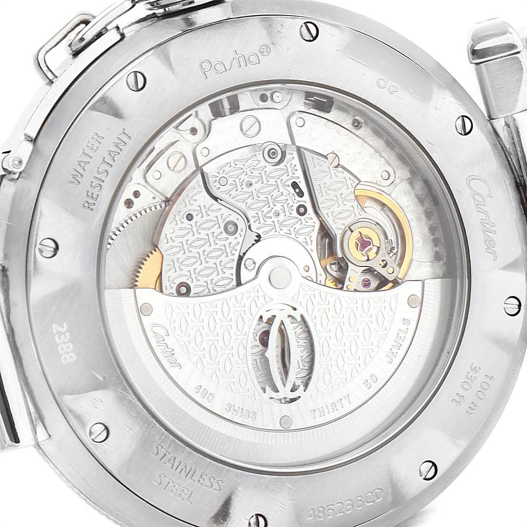 The image shows the rear view of a Cartier Pasha W31037H3 Men's Stainless Steel Silver Dial W31037H3 Men's Stainless Steel Silver Dial watch, highlighting its intricate mechanical movement and engravings.