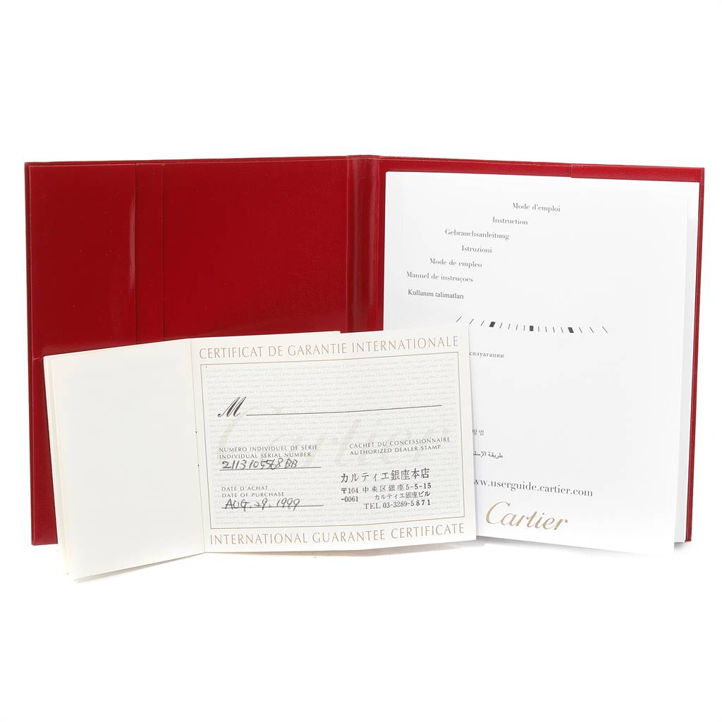 The image shows the warranty and documents for a Cartier Pasha W31030H3 Men
s Stainless Steel Silver Dial W31030H3 Men
s Stainless Steel Silver Dial watch, including a red folder and papers.