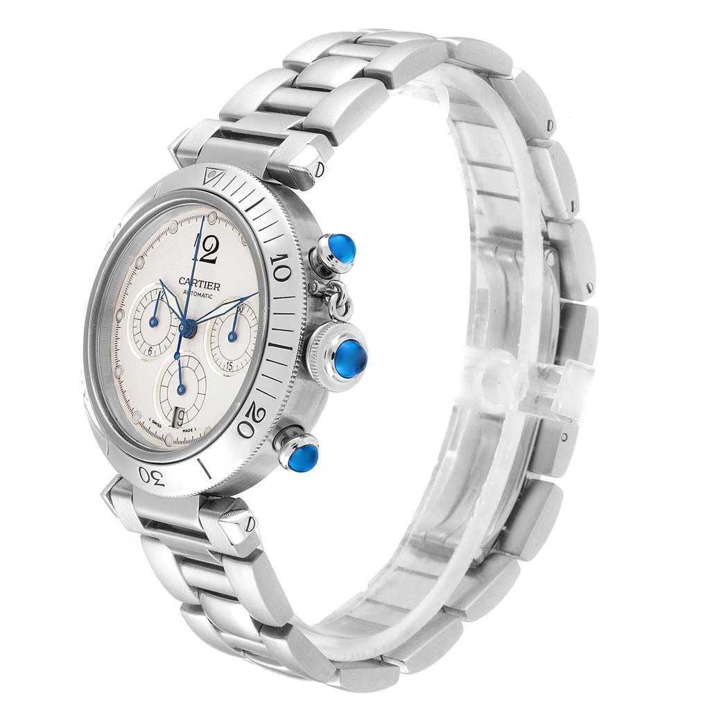 The image shows a side angle of the Pasha Cartier watch, highlighting the bezel, crown, pushers, and bracelet.