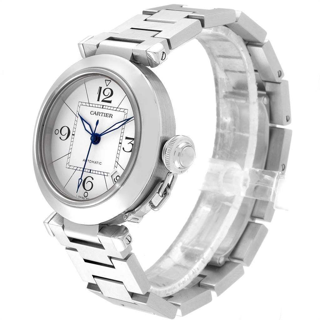 The Cartier Pasha W31074M7 Stainless Steel White Dial W31074M7 Stainless Steel White Dial watch is shown from a three-quarter angle, highlighting the face, crown, and stainless steel bracelet.