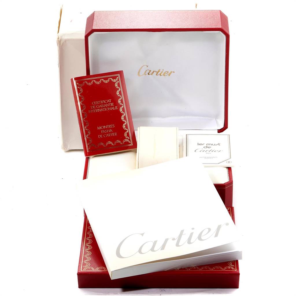 The image shows the original packaging, manuals, and warranty for a Cartier Pasha W31012H3 Men's Stainless Steel Silver Dial W31012H3 Men's Stainless Steel Silver Dial watch, with no view of the watch itself.