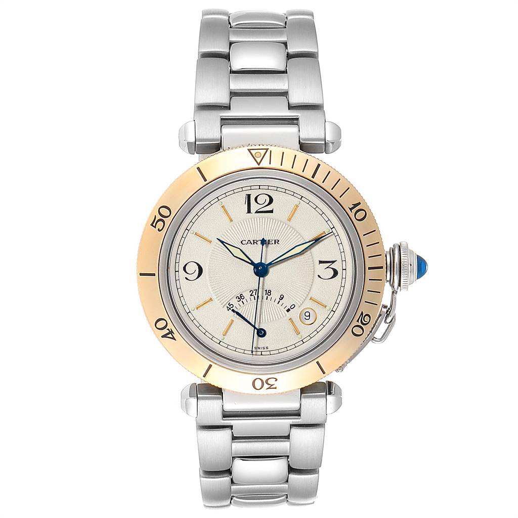 The image shows a front view of a Cartier Pasha W31012H3 Men's Stainless Steel Silver Dial W31012H3 Men's Stainless Steel Silver Dial watch, featuring its dial, bracelet, bezel, and crown with a blue cabochon.