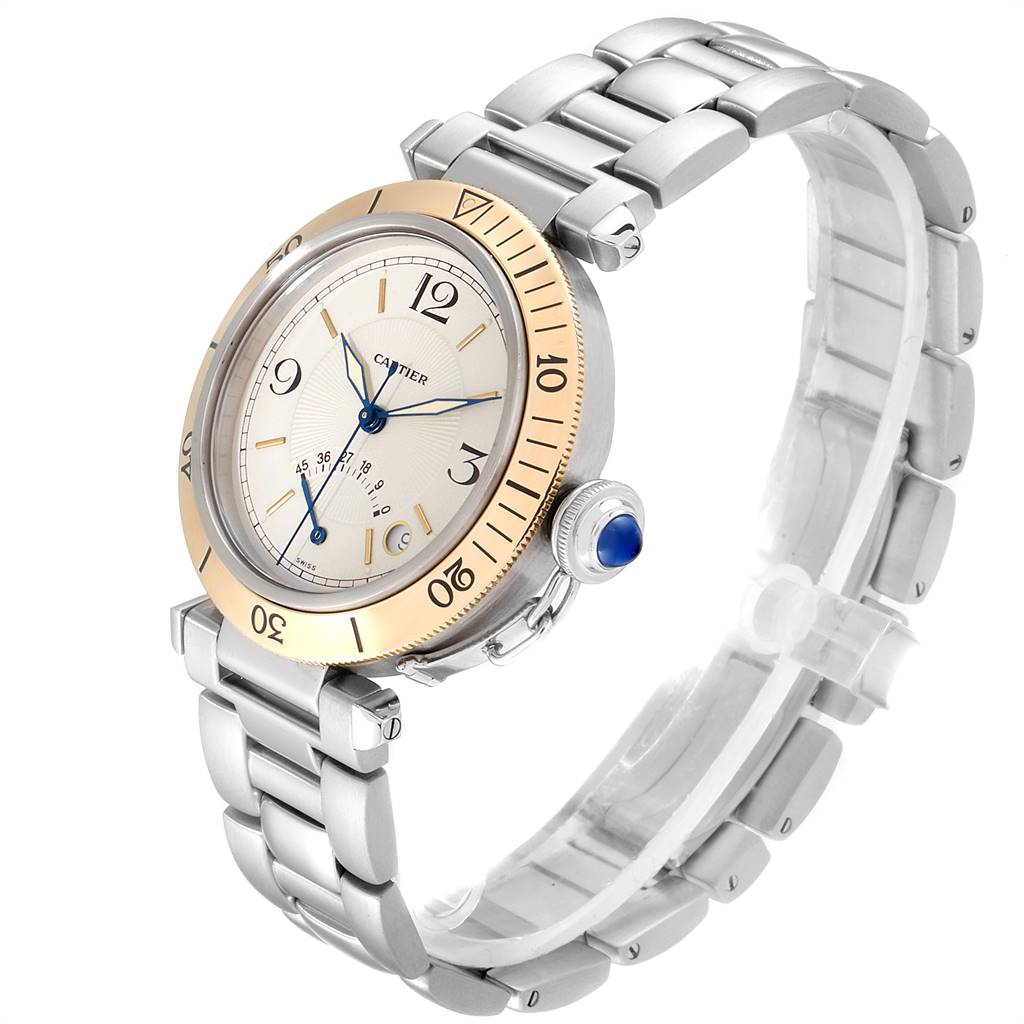 The image displays a Cartier Pasha W31012H3 Men's Stainless Steel Silver Dial W31012H3 Men's Stainless Steel Silver Dial watch from a three-quarter angle, showcasing the face, bezel, bracelet, and crown.