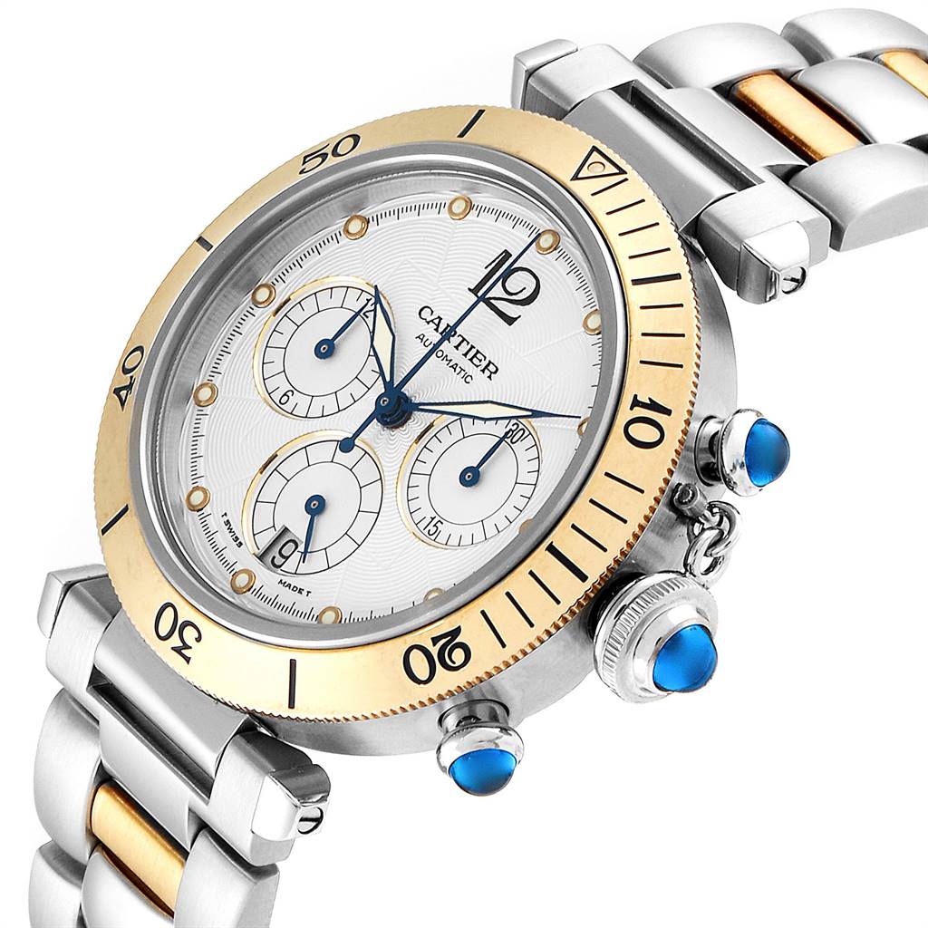 The image shows a Cartier Pasha W31036T6 Men's Stainless Steel Silver Dial W31036T6 Men's Stainless Steel Silver Dial watch from an angled top view, highlighting the bezel, subdials, and bracelet.