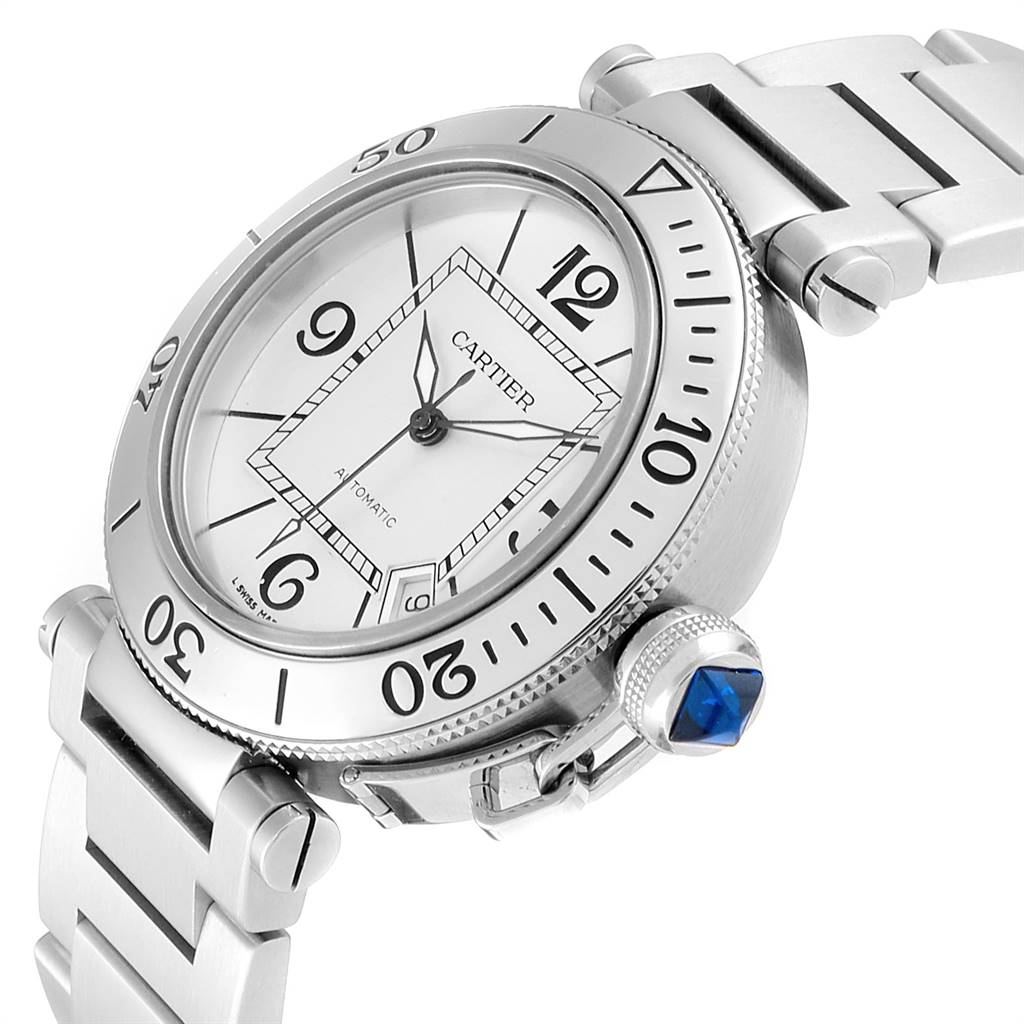 The image shows a frontal and slightly angled view of a Cartier Pasha W31080M7 Men's Stainless Steel Silver Dial W31080M7 Men's Stainless Steel Silver Dial watch, highlighting the bezel, dial, and part of the bracelet.