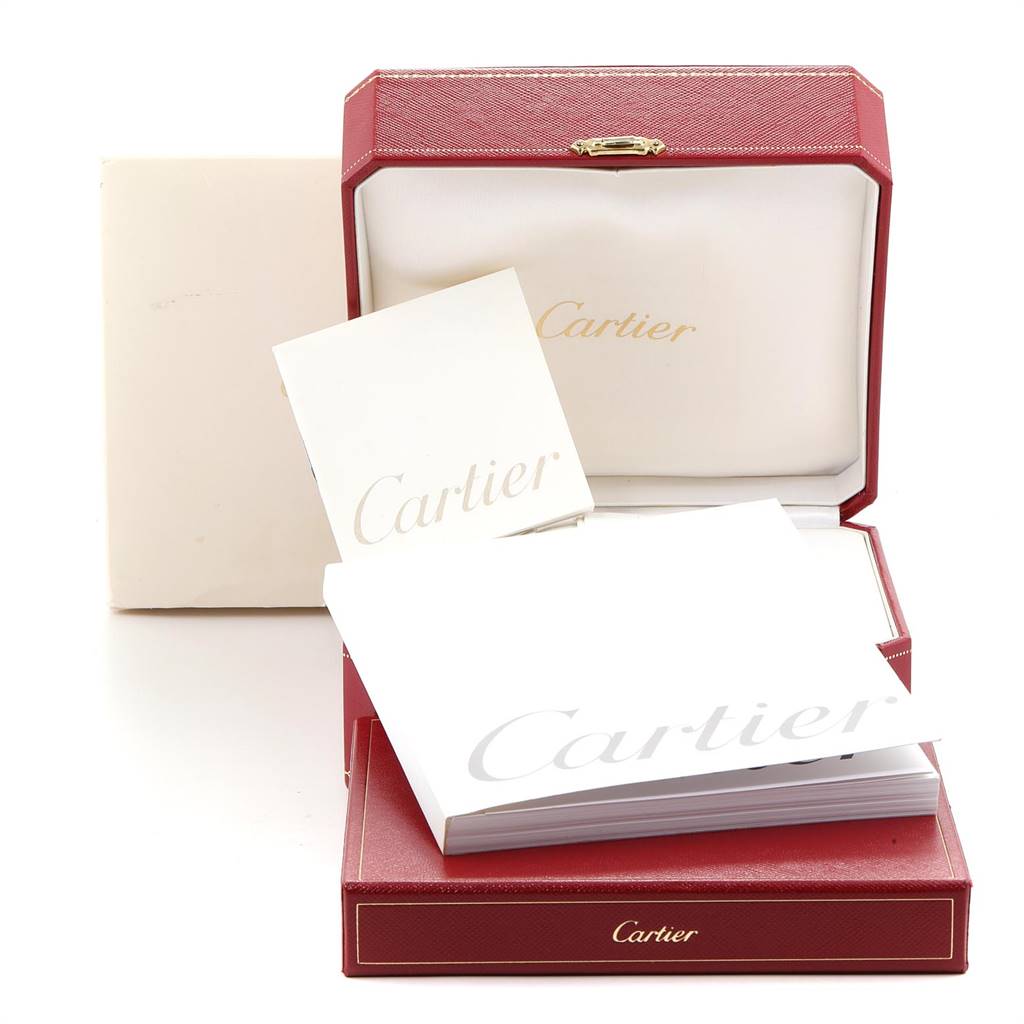 The image shows the packaging and documentation for a Cartier Pasha W31059H3 Men
s Stainless Steel Silver Dial W31059H3 Men
s Stainless Steel Silver Dial model watch, including the box and booklets.