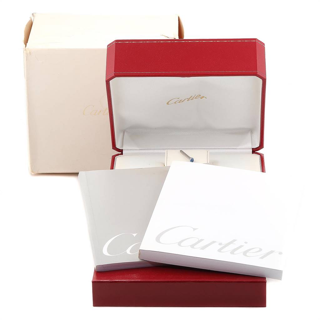 The image shows the box and manuals for the Cartier Pasha W31037H3 Men
s Stainless Steel Silver Dial W31037H3 Men
s Stainless Steel Silver Dial watch, including an open red watch box and booklets.