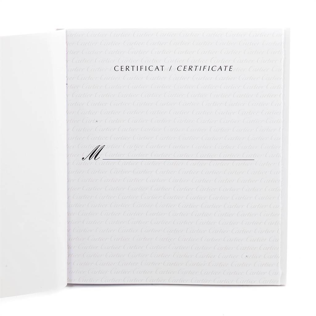 The image shows an open certificate booklet for a Cartier Pasha W31037H3 Men
s Stainless Steel Silver Dial W31037H3 Men
s Stainless Steel Silver Dial watch.