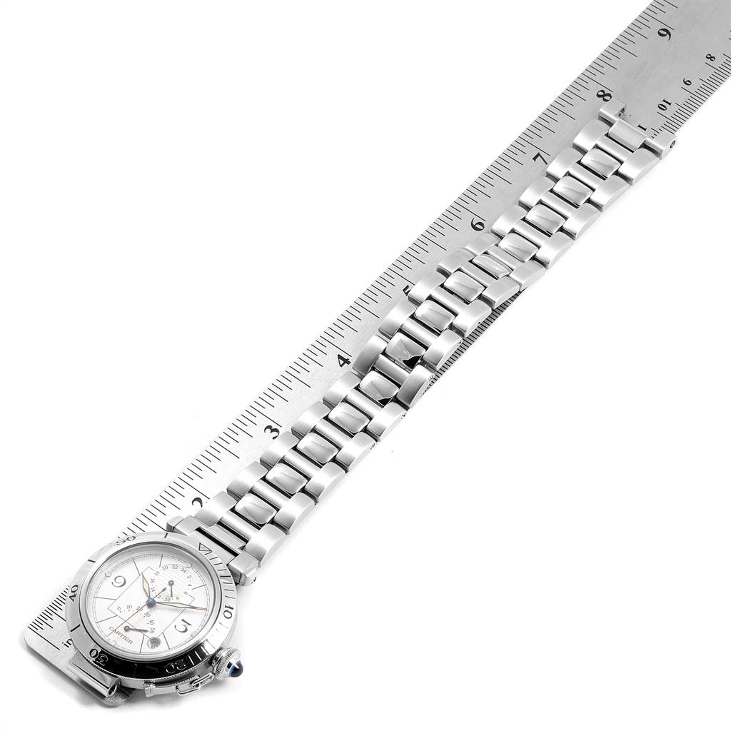 The image shows a Cartier Pasha W31037H3 Men
s Stainless Steel Silver Dial W31037H3 Men
s Stainless Steel Silver Dial watch laid out flat, with its band measured against a ruler.