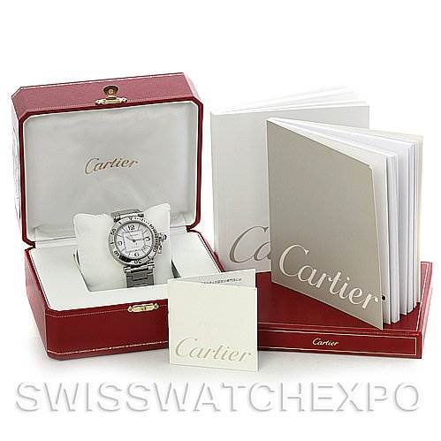 This image shows a Cartier Pasha W31080M7 Men's Stainless Steel White Dial W31080M7 Men's Stainless Steel White Dial watch displayed in an open red box, accompanied by several booklets.