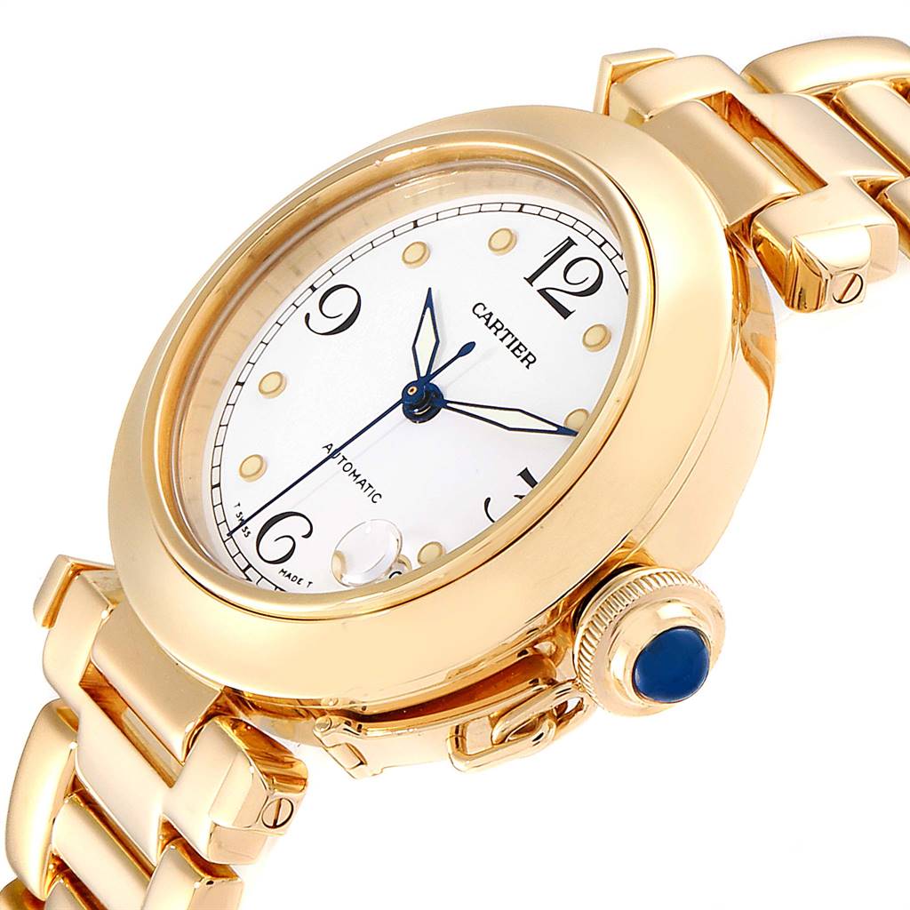 This image shows a Cartier Pasha WJ1110H9 Men's Yellow Gold White Dial WJ1110H9 Men's Yellow Gold White Dial watch at a slight side angle, highlighting the face, crown, and a portion of the band.