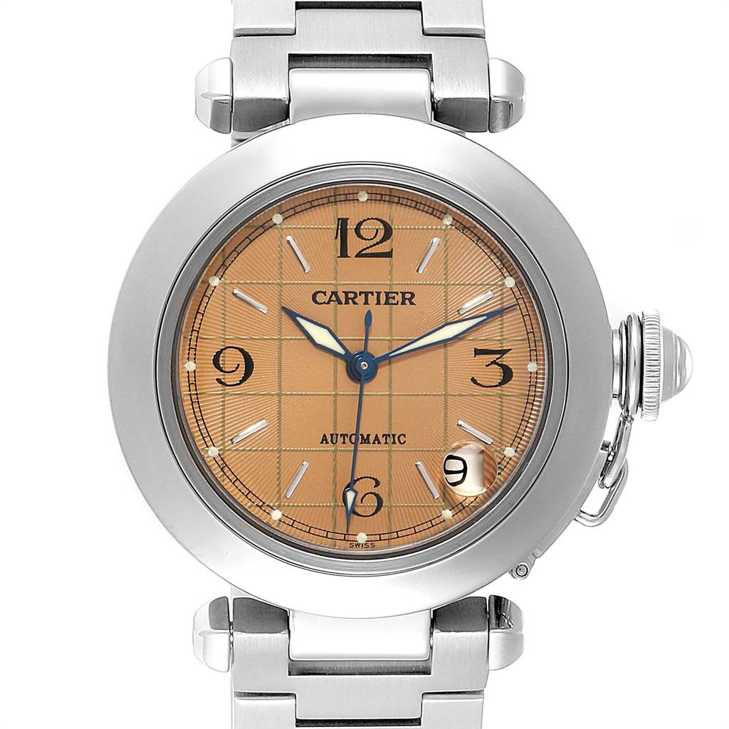 The image shows a front view of the Cartier Pasha W31024M7 Men's Stainless Steel Pink Dial W31024M7 Men's Stainless Steel Pink Dial watch, highlighting its dial, numerals, and metallic bracelet.