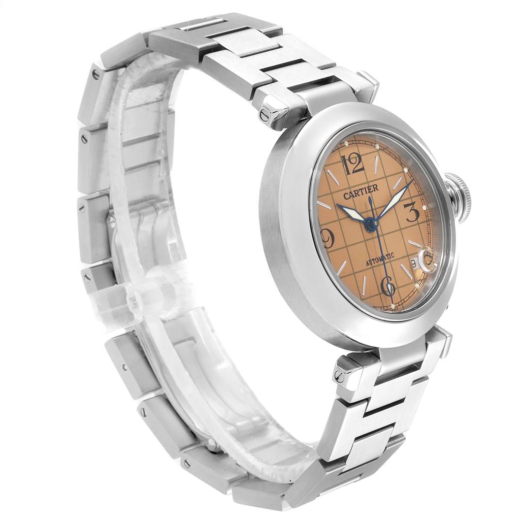 The image shows a side angle view of a Cartier Pasha W31024M7 Men's Stainless Steel Pink Dial W31024M7 Men's Stainless Steel Pink Dial watch, displaying its bracelet, face, and crown.