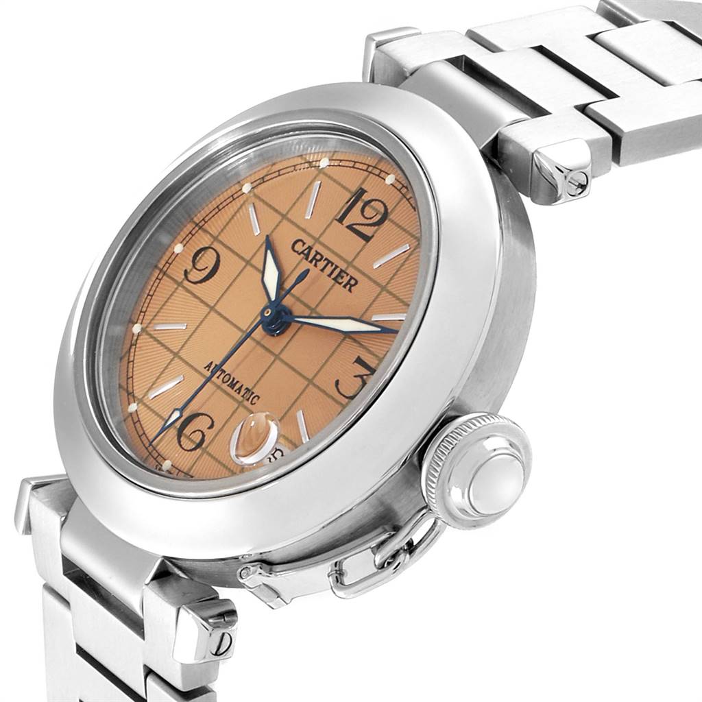 The Cartier Pasha W31024M7 Men's Stainless Steel Pink Dial W31024M7 Men's Stainless Steel Pink Dial model watch is shown at an angled view, highlighting its face, crown, and part of the bracelet.