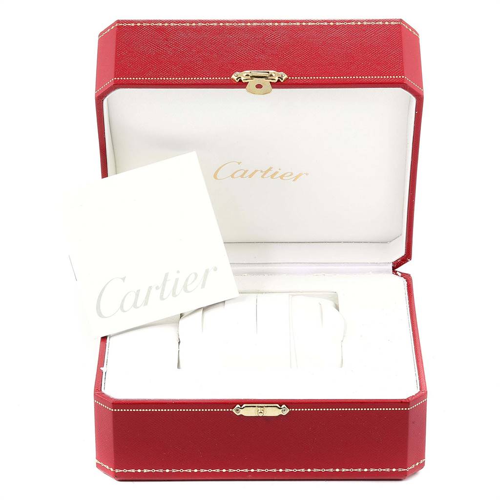 This image shows an open red Cartier box for the Pasha model watch and a Cartier-branded booklet.