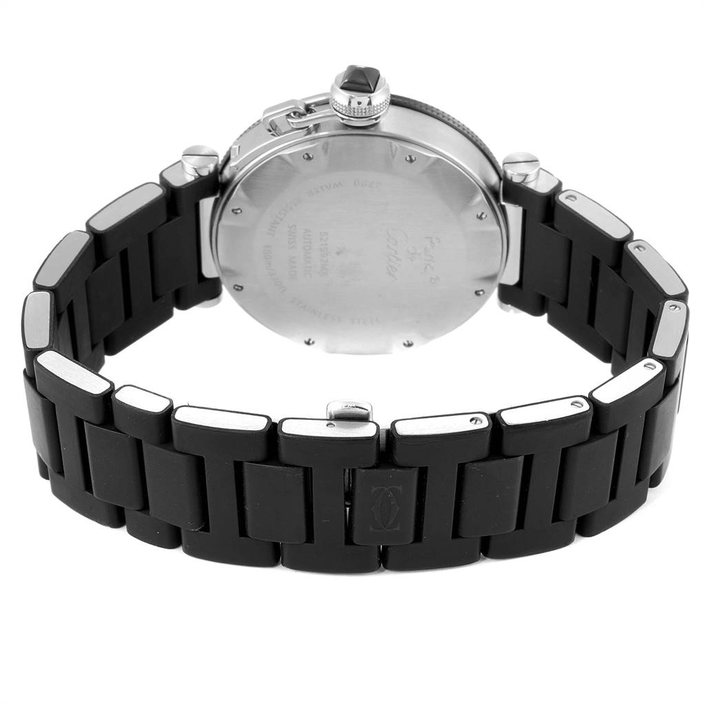 The image shows the back view of a Pasha model watch by Cartier, highlighting the case back and stainless steel bracelet with black links.