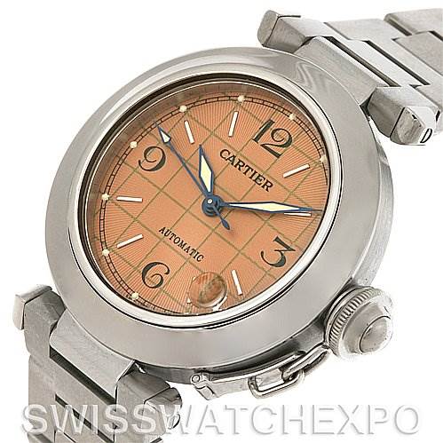 This image shows a slightly angled view of a Cartier Pasha W31075M7 Men
s Stainless Steel Pink Dial W31075M7 Men
s Stainless Steel Pink Dial model watch, displaying its face, bezel, and a portion of the metal strap.