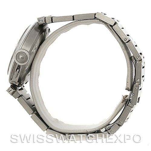 The image shows a side view of the Cartier Pasha W31043M7 Men's Stainless Steel Silver Dial W31043M7 Men's Stainless Steel Silver Dial watch, highlighting the watch case, crown, and linked bracelet.