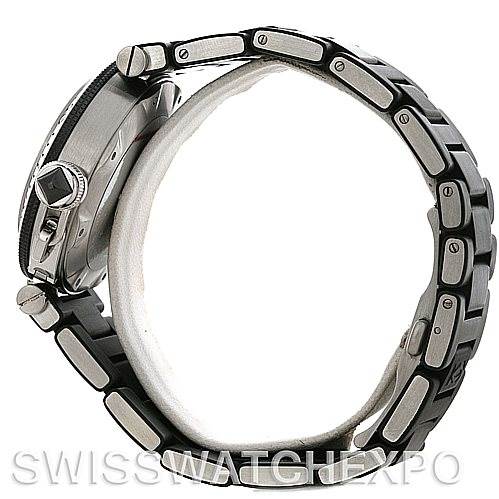 This image shows a side view of the Cartier Pasha W31077U2 Men's Stainless Steel Black Dial W31077U2 Men's Stainless Steel Black Dial watch, focusing on its metal bracelet and case.