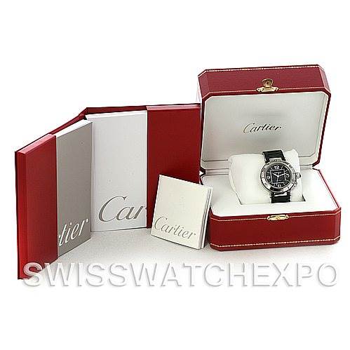 The image shows a Cartier Pasha W31077U2 Men's Stainless Steel Black Dial W31077U2 Men's Stainless Steel Black Dial watch in an open red box, accompanied by its packaging and booklets.