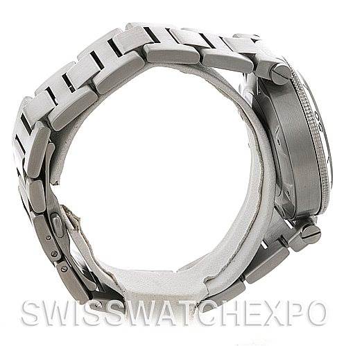 The image shows a side view of a Cartier Pasha W31080M7 Men
s Stainless Steel Silver Dial W31080M7 Men
s Stainless Steel Silver Dial watch, focusing on the bracelet and the watch case with crown guards.