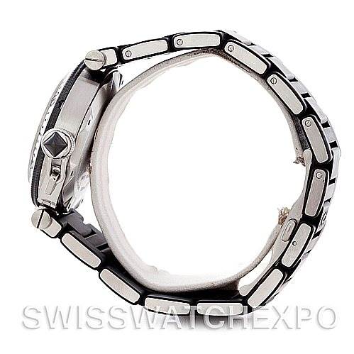 The image shows a side view of a Cartier Pasha W31077U2 Men
s Stainless Steel Black Dial W31077U2 Men
s Stainless Steel Black Dial watch, focusing on the crown, bezel, and bracelet links.