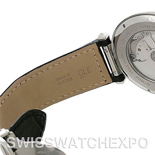 The image shows the open back and strap of the Pasha model by Cartier, showing the watch
s inner mechanism and "Made in Austria" marking on the strap.