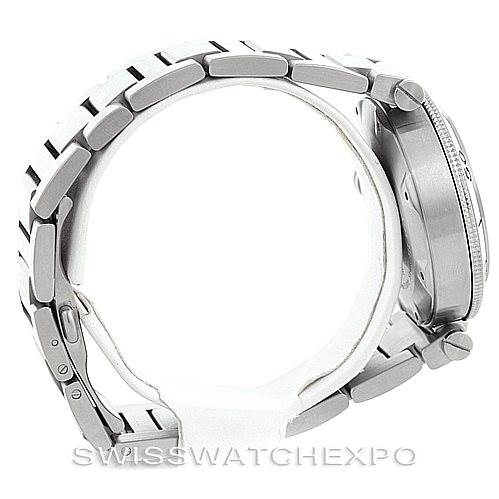 This image shows a side view of the Cartier Pasha W31080M7 Men
s Stainless Steel Silver Dial W31080M7 Men
s Stainless Steel Silver Dial watch, highlighting the case, bezel, crown, and part of the bracelet.