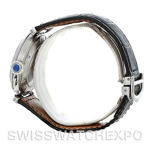 The image shows a side profile of the Cartier Pasha Men's Stainless Steel Silver Dial Men's Stainless Steel Silver Dial watch, highlighting its crown with a blue cabochon and leather strap.